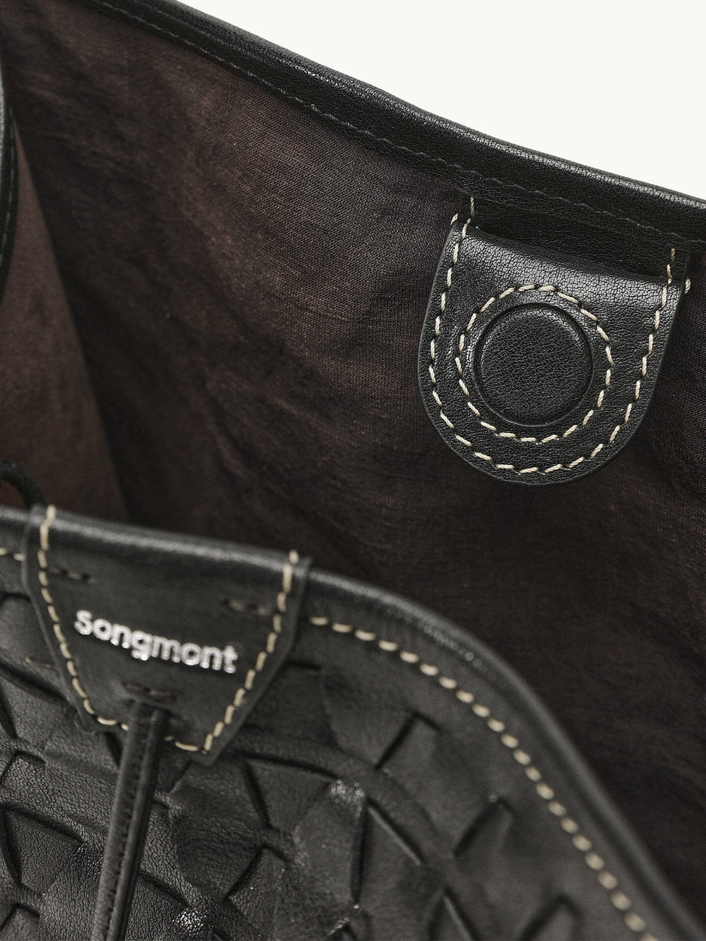 Songmont Lattice Bucket Bag Onyx - interior lining detail