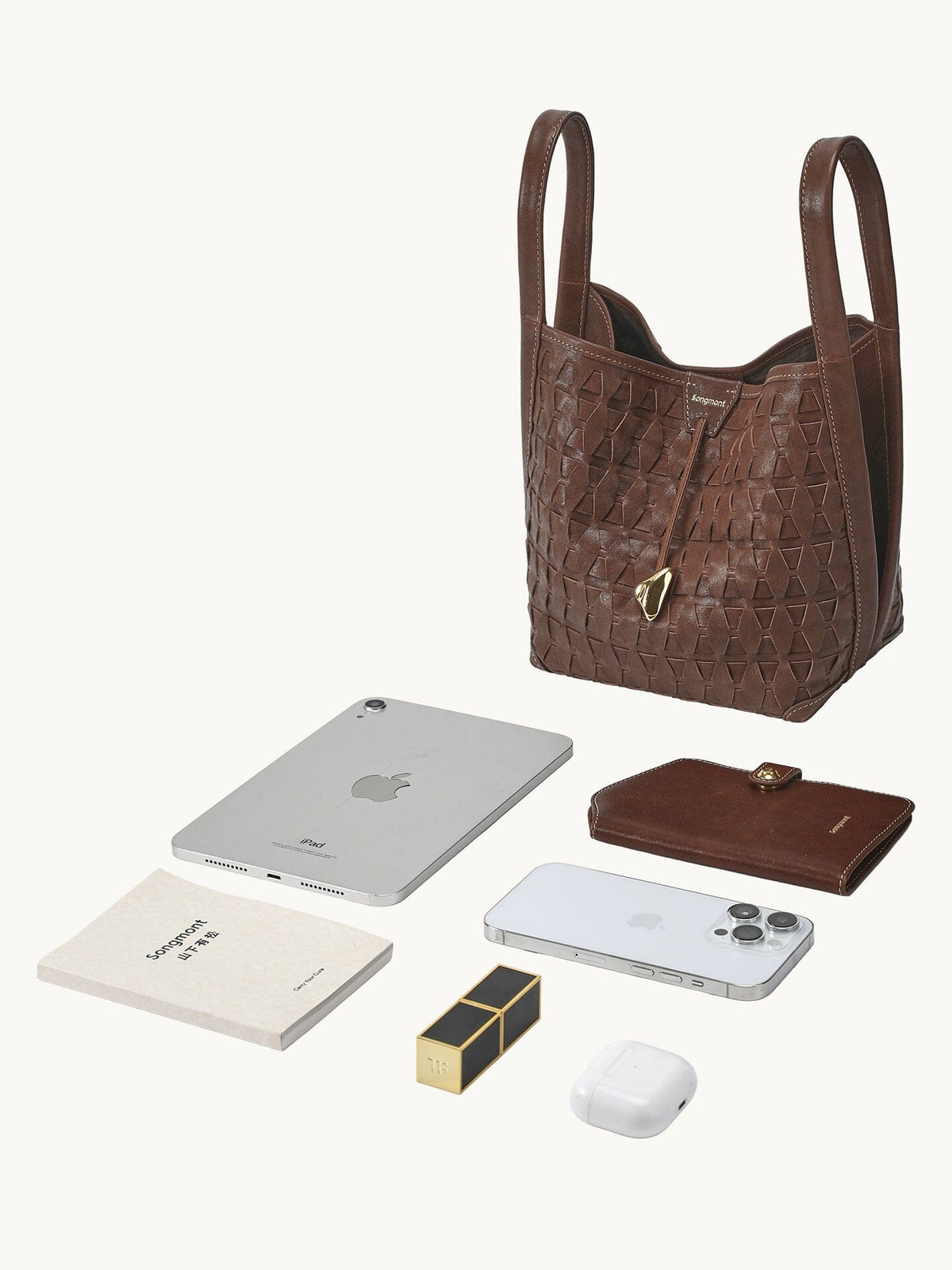 Songmont Lattice Bucket Bag Sandal - flat lay with iPad Mini and essentials