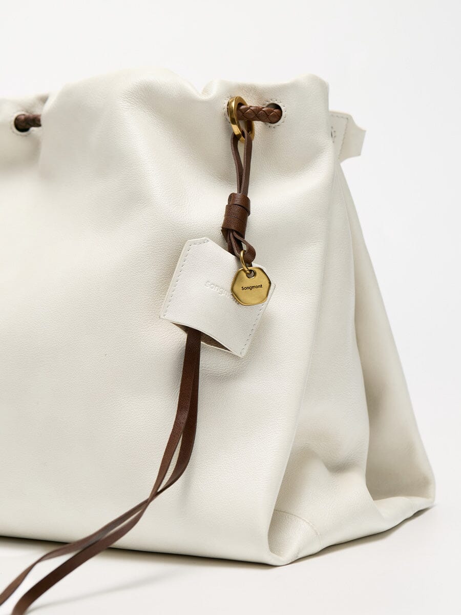 Songmont Medium Gather Bag - Cloud with dark brown accents and logo tag