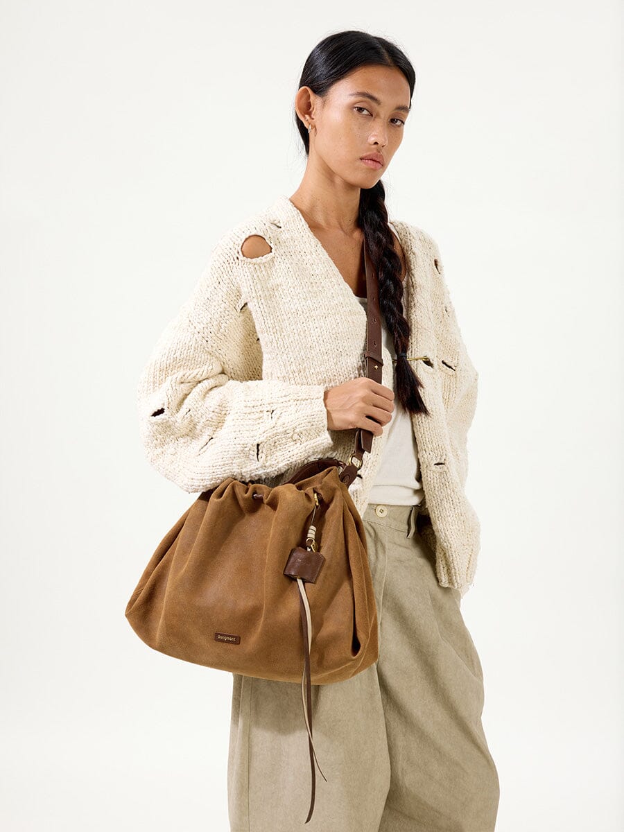 Songmont Medium Gather Bag - Ochre Suede worn, slouchy silhouette