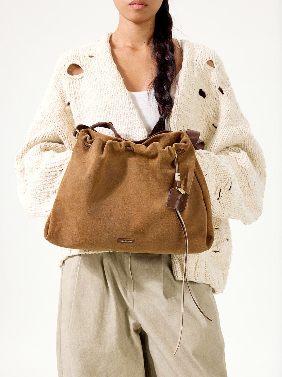 Songmont Medium Gather Bag - Ochre Suede drawstring and charm detail