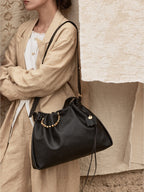 Songmont Medium Gather Bag - Onyx drawcord closure and beaded handle detail