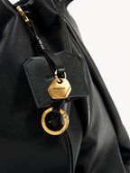 Songmont Medium Gather Bag - Onyx leather texture with logo detail