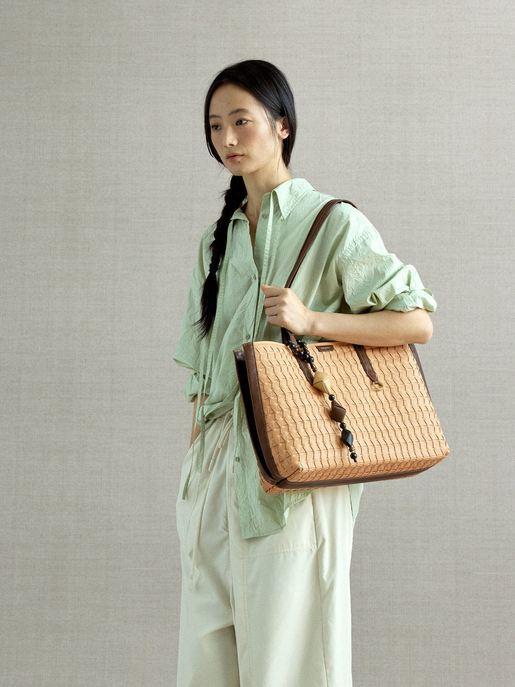 Songmont Medium Lattice Tote Sulfur - worn on the shoulder