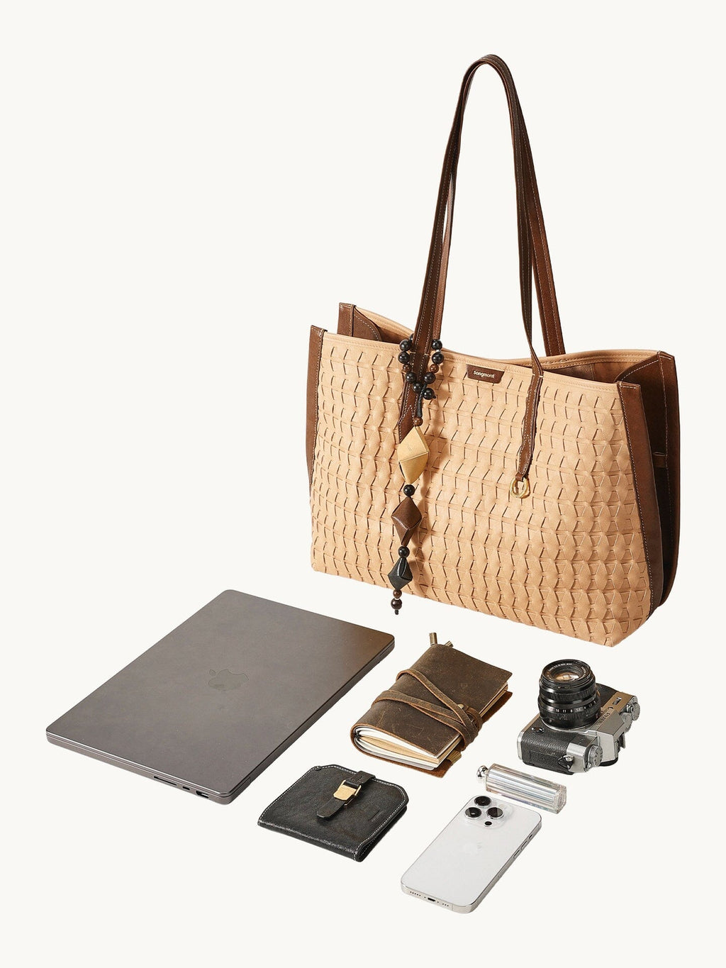 Songmont Medium Lattice Tote Sulfur - flat lay with laptop and essentials