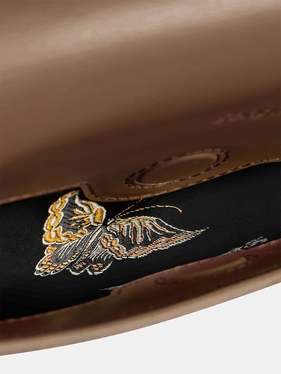 Songmont Medium Reset Tofu Bag Caramel - flap lifted to show the butterfly lining