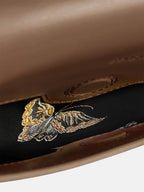 Songmont Medium Reset Tofu Bag Caramel - flap lifted to show the butterfly lining