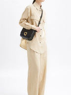 Songmont Medium Reset Tofu Bag Onyx - worn crossbody with a linen outfit