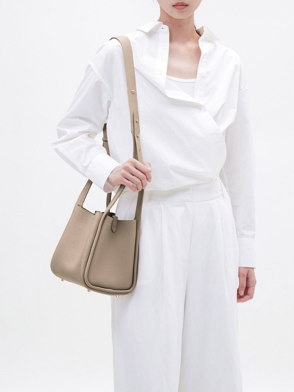 Songmont Medium Song Bag Cream Apricot worn crossbody