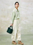 Songmont Medium Song Bag Emerald carried, full length