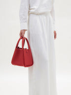 Songmont Medium Song Bag Lucky Red carried by hand