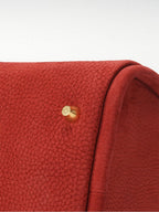 Songmont Medium Song Bag Poppy metal foot detail