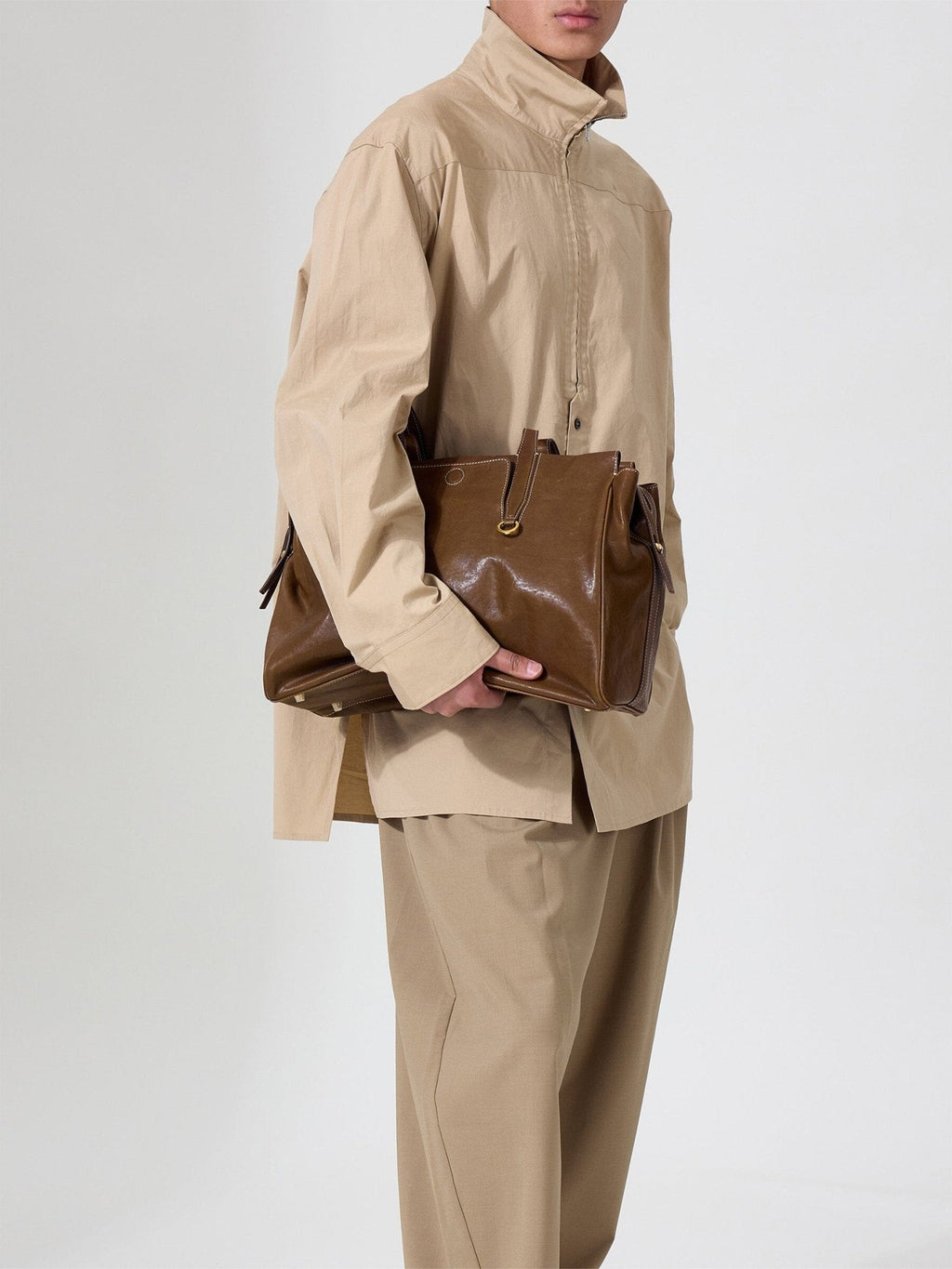 Songmont Medium Yore Duffle Bag Sandal - carried under the arm, front view