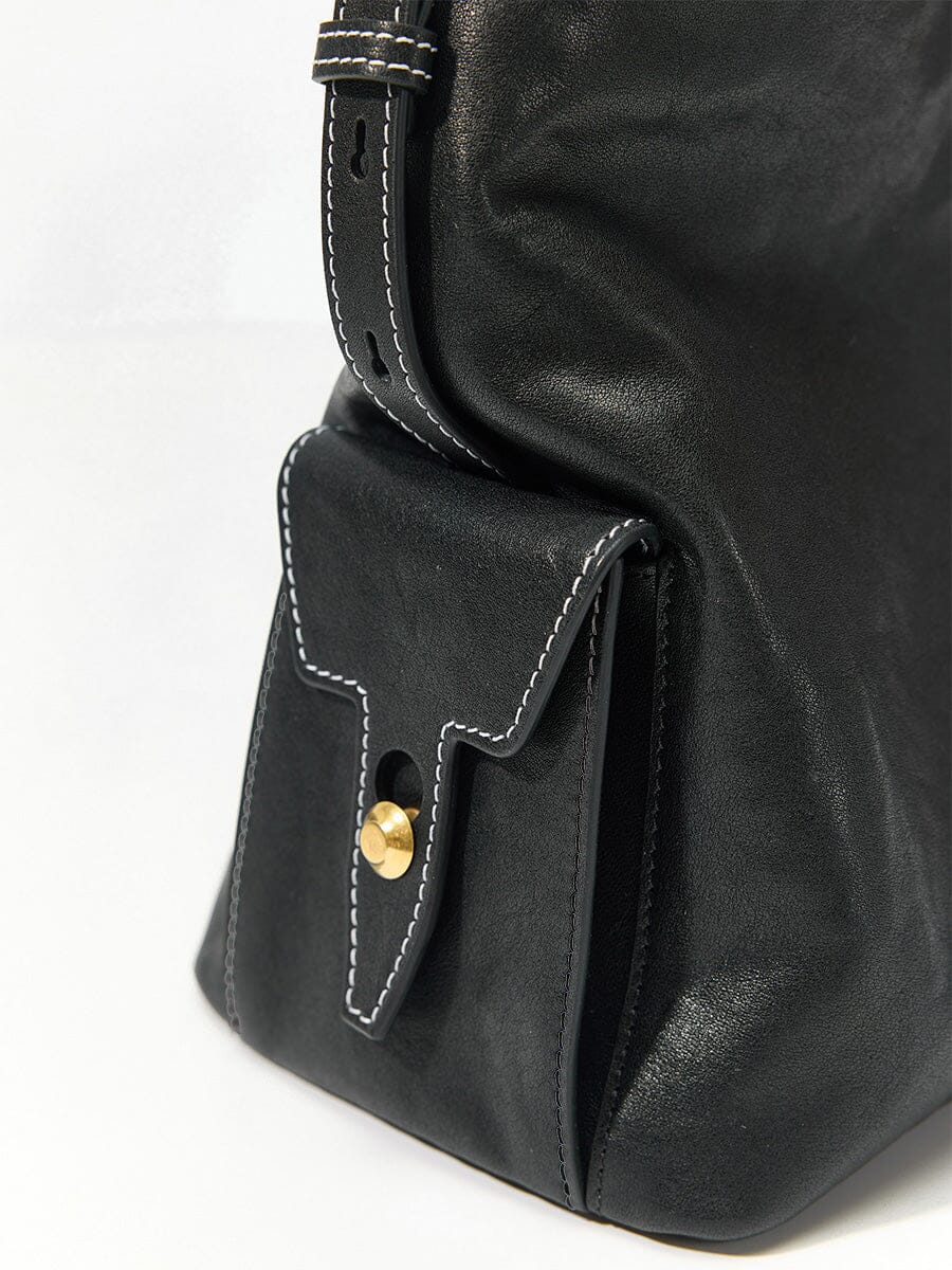 Songmont Medium Yore Hobo Bag Onyx front flap pocket detail