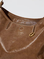 Songmont Medium Yore Hobo Bag Sandal lifestyle shot