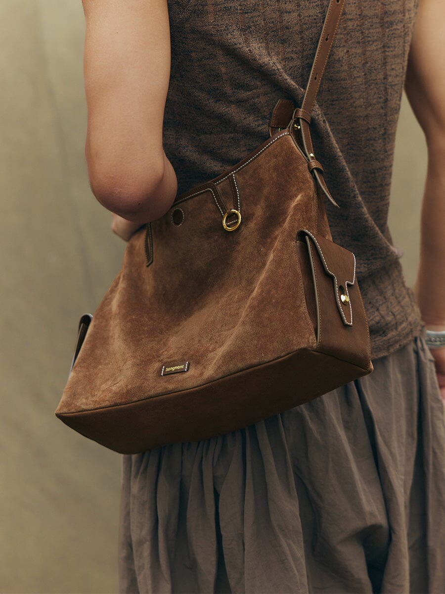 Songmont Medium Yore Hobo Bag Sandal Suede worn on the shoulder