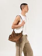 Songmont Medium Yore Hobo Bag Sandal Suede front flap pocket detail