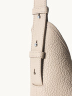 Songmont Medium Yore Shoulder Bag Smoke Grey - adjustable strap and buckle close-up