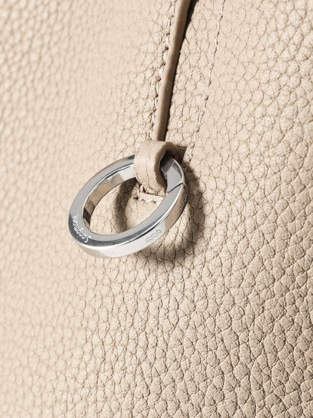 Songmont Medium Yore Shoulder Bag Smoke Grey - metal ring detail close-up