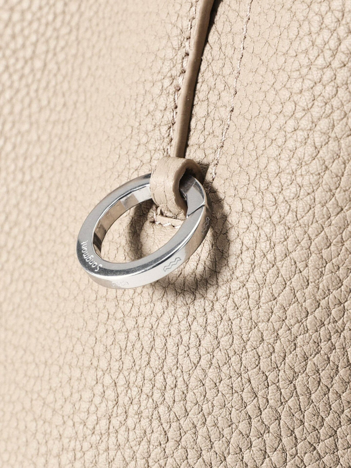 Songmont Medium Yore Shoulder Bag Smoke Grey - metal ring detail close-up