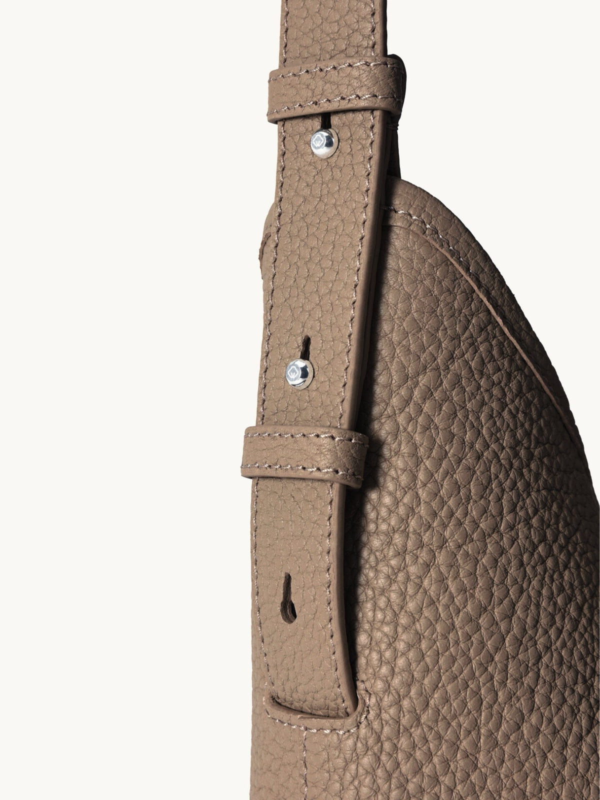 Songmont Medium Yore Shoulder Bag Stone - adjustable strap and buckle close-up