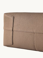 Songmont Medium Yore Shoulder Bag Stone - base corner close-up