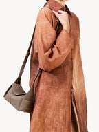 Songmont Mini Drippy Roof Bag Taupe - worn on the shoulder