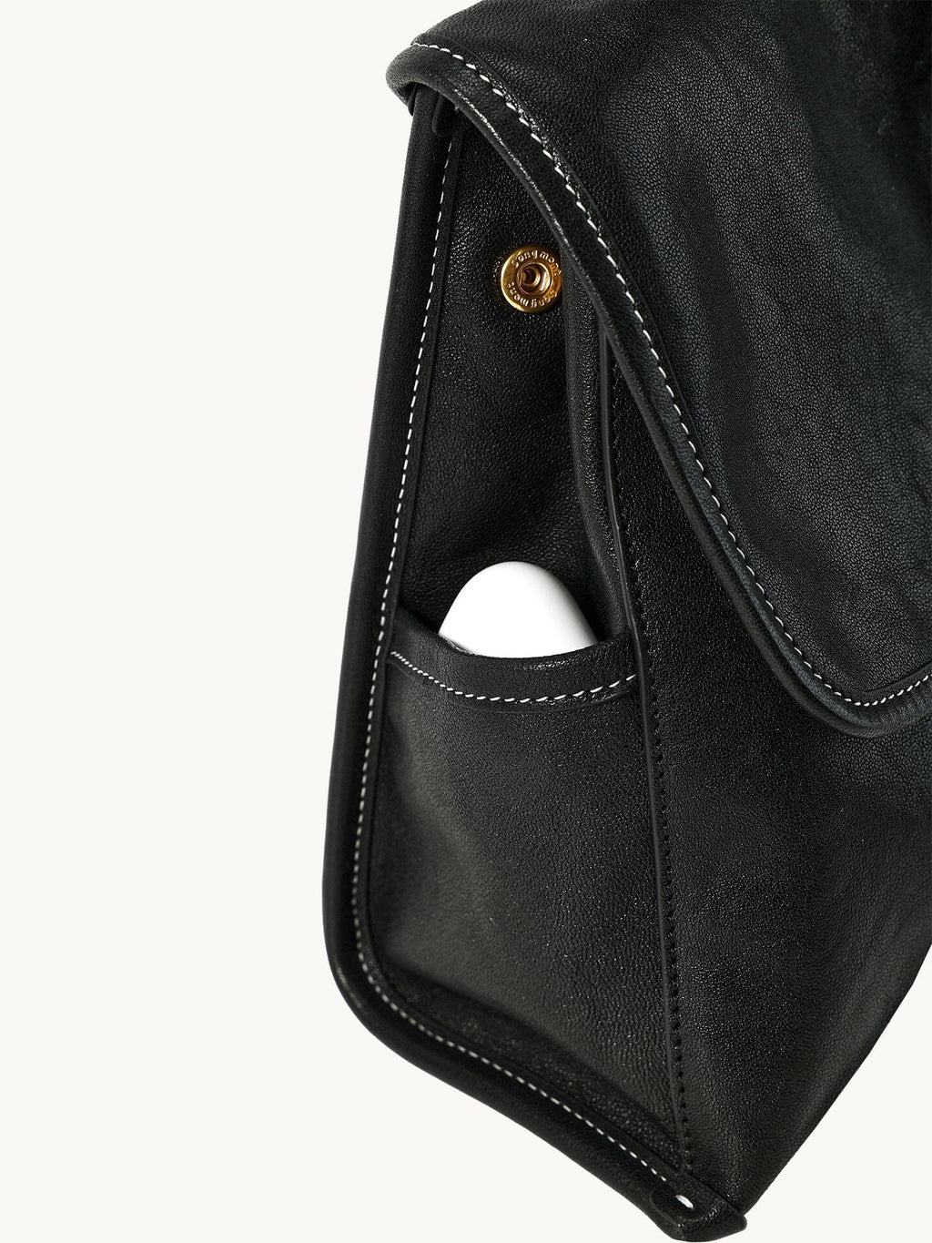 Songmont Mini Shan Backpack Onyx - side pocket close-up with stud and stitching