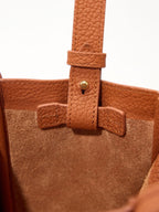 Songmont Mini Song Bag Brandy - strap and interior tab detail