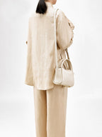 Songmont Mini Song Bag Ivory - worn cross-body, back view