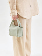 Songmont Mini Song Bag Jade - carried by hand