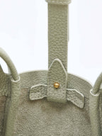 Songmont Mini Song Bag Jade - strap and interior tab detail