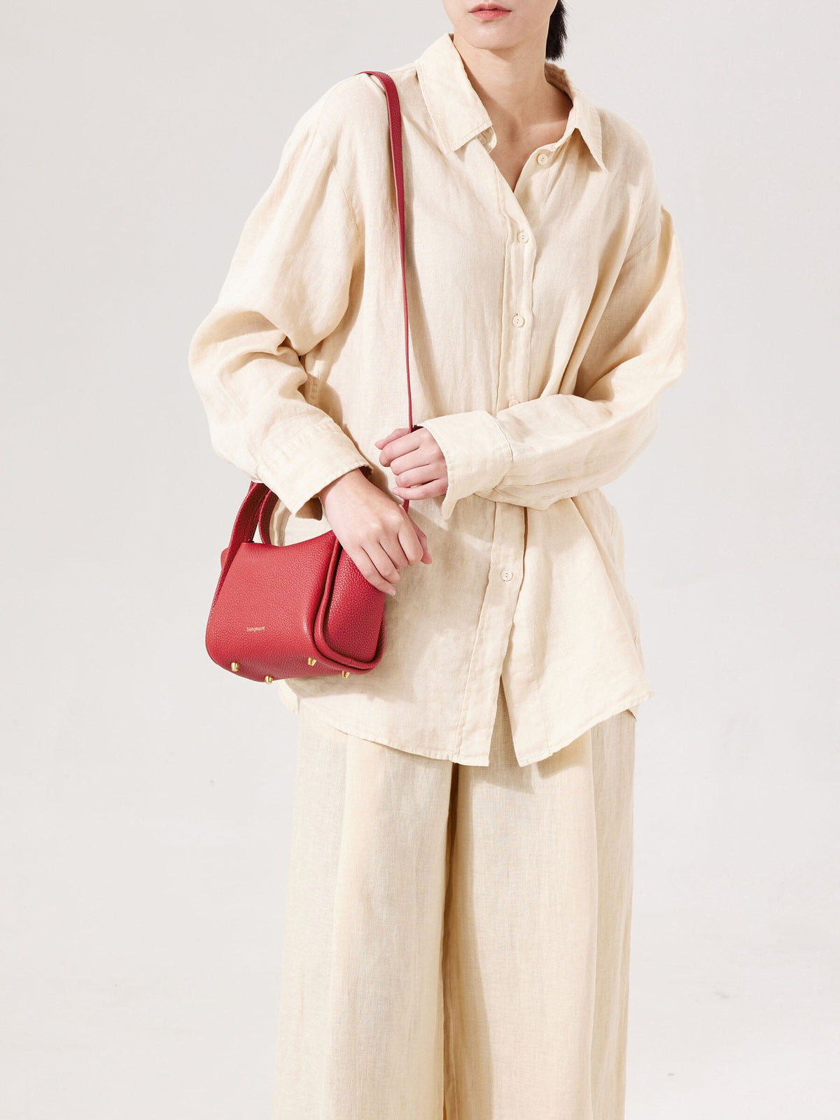 Songmont Mini Song Bag Lucky Red - worn cross-body, side view