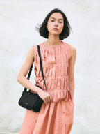Songmont Mini Song Bag Onyx - worn cross-body