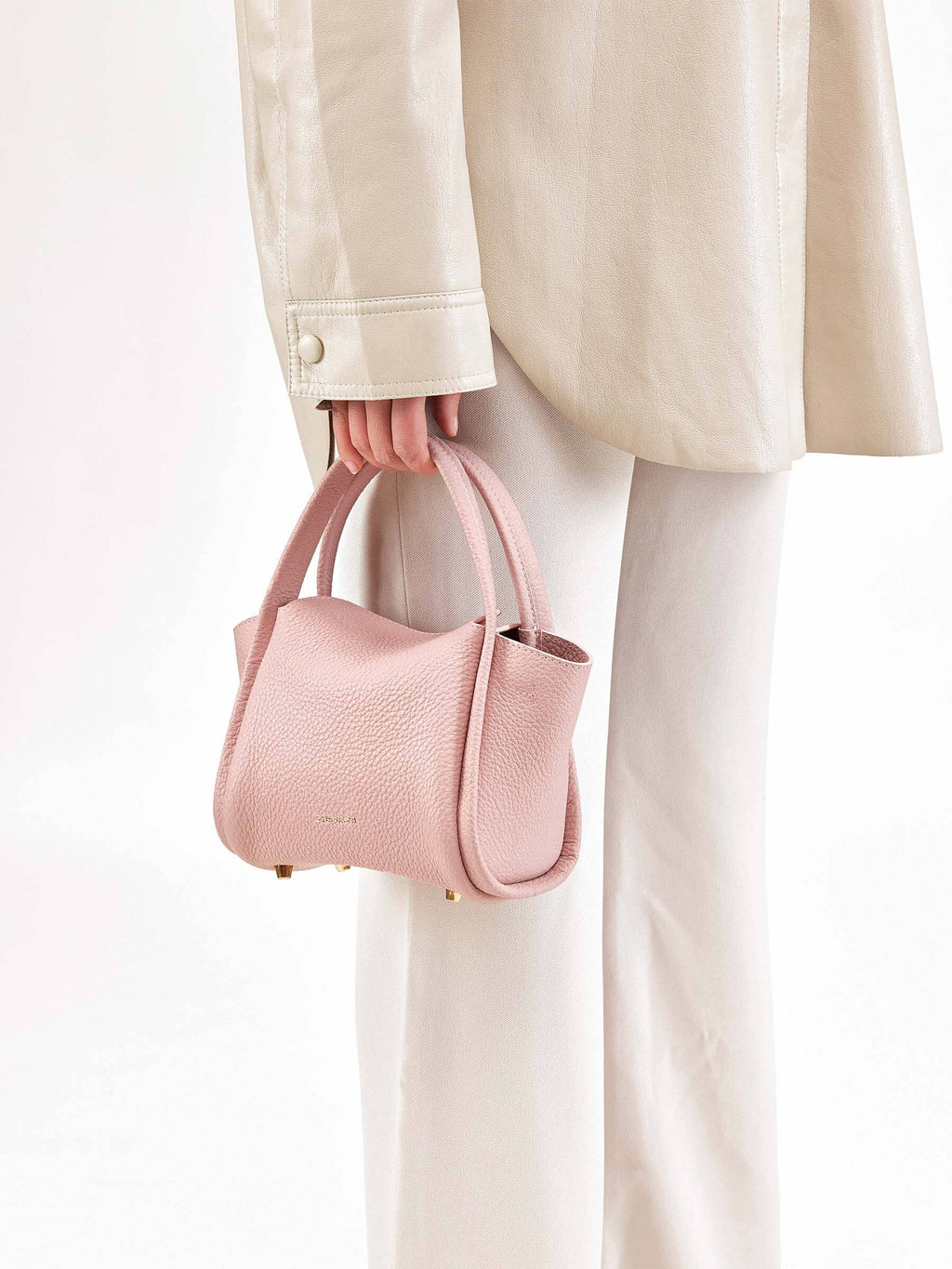 Songmont Mini Song Bag Pink - carried by hand