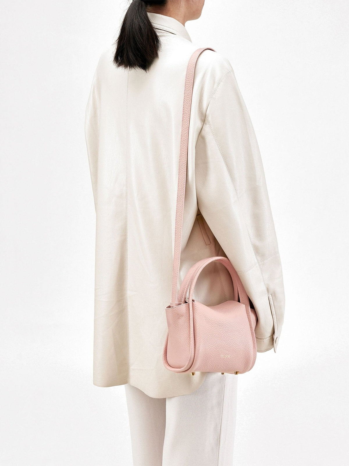 Songmont Mini Song Bag Pink - worn cross-body
