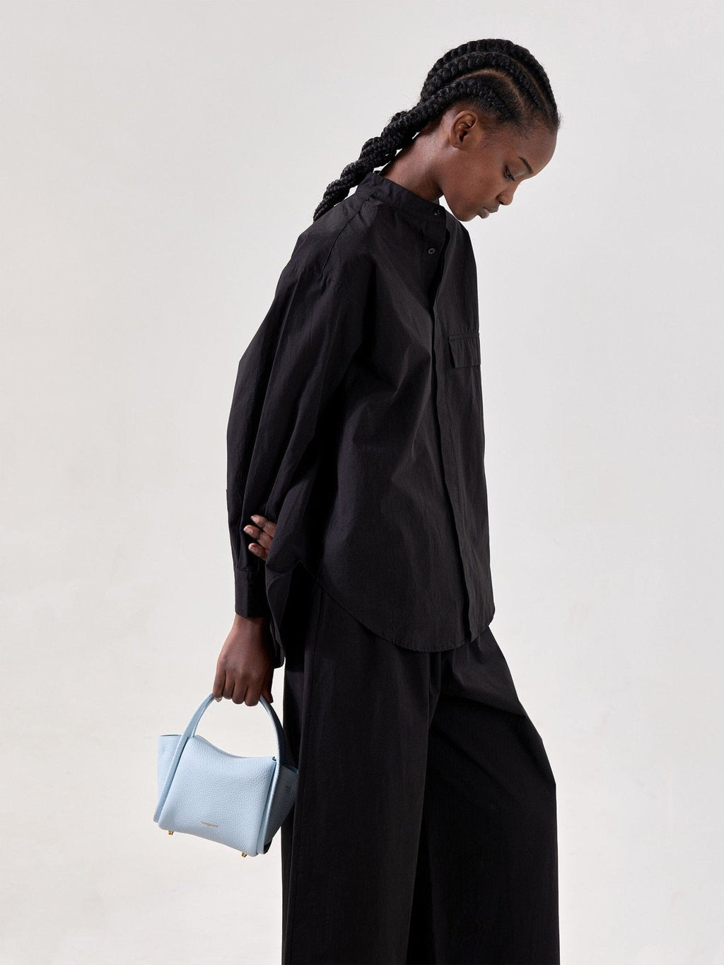 Songmont Mini Song Bag Sky - carried by hand