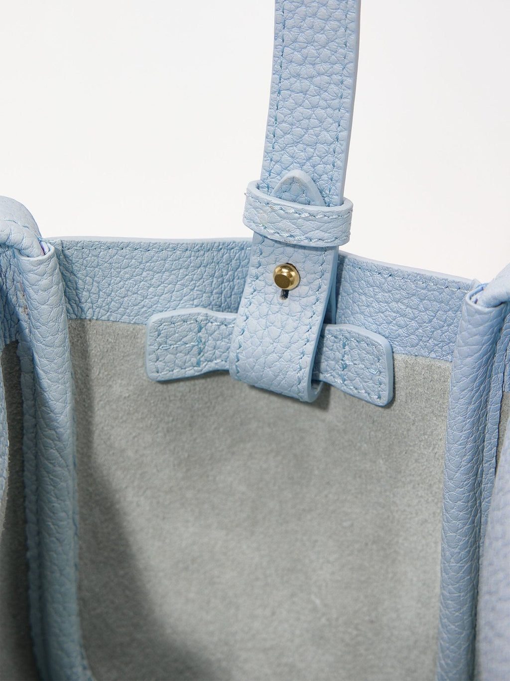 Songmont Mini Song Bag Sky - strap and interior tab detail