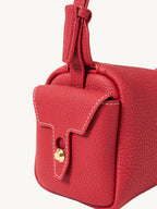 Songmont Mini Yore Camera Bag Lucky Red - close-up of the stitched end flap and metal stud