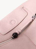 Songmont Mini Yore Camera Bag Peach - close-up of the zip with black bead pull