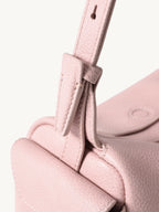 Songmont Mini Yore Camera Bag Peach - close-up of the strap tab and stitched flap