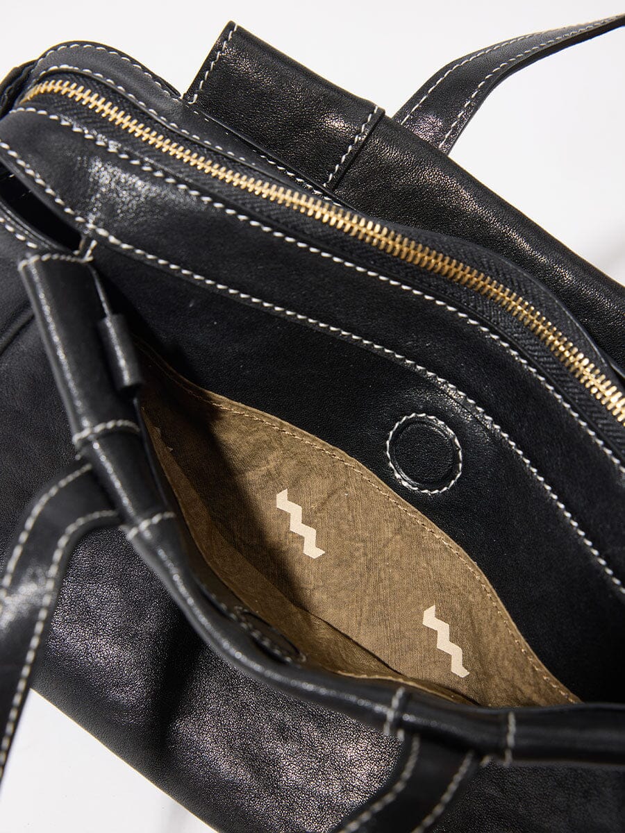 Songmont Mini Yore Duffle Bag Onyx - close-up of interior zip and lining