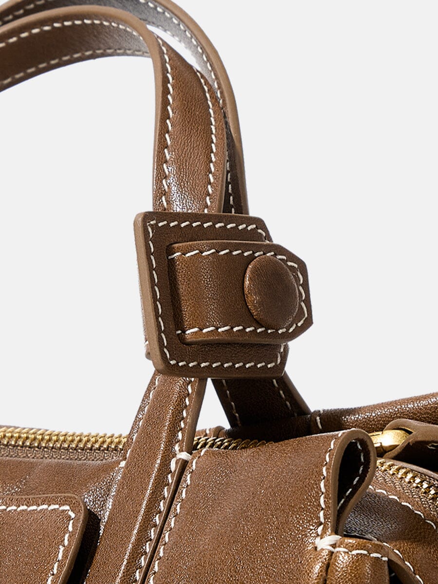 Songmont Mini Yore Duffle Bag Sandal - close-up of handle tab, stitching and zip