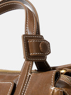 Songmont Mini Yore Duffle Bag Sandal - close-up of handle tab, stitching and zip