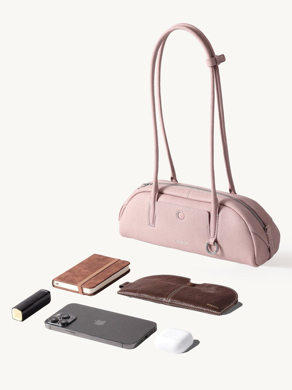 Songmont Mini Yore Toast Bag Peach - flat lay with phone, notebook and everyday items