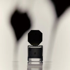 TO SUMMER Rambler Rose Eau de Parfum bottle in shadow light