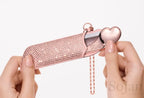 ReFa AIRA CASE Jewel with HEART COMB Aira in hand
