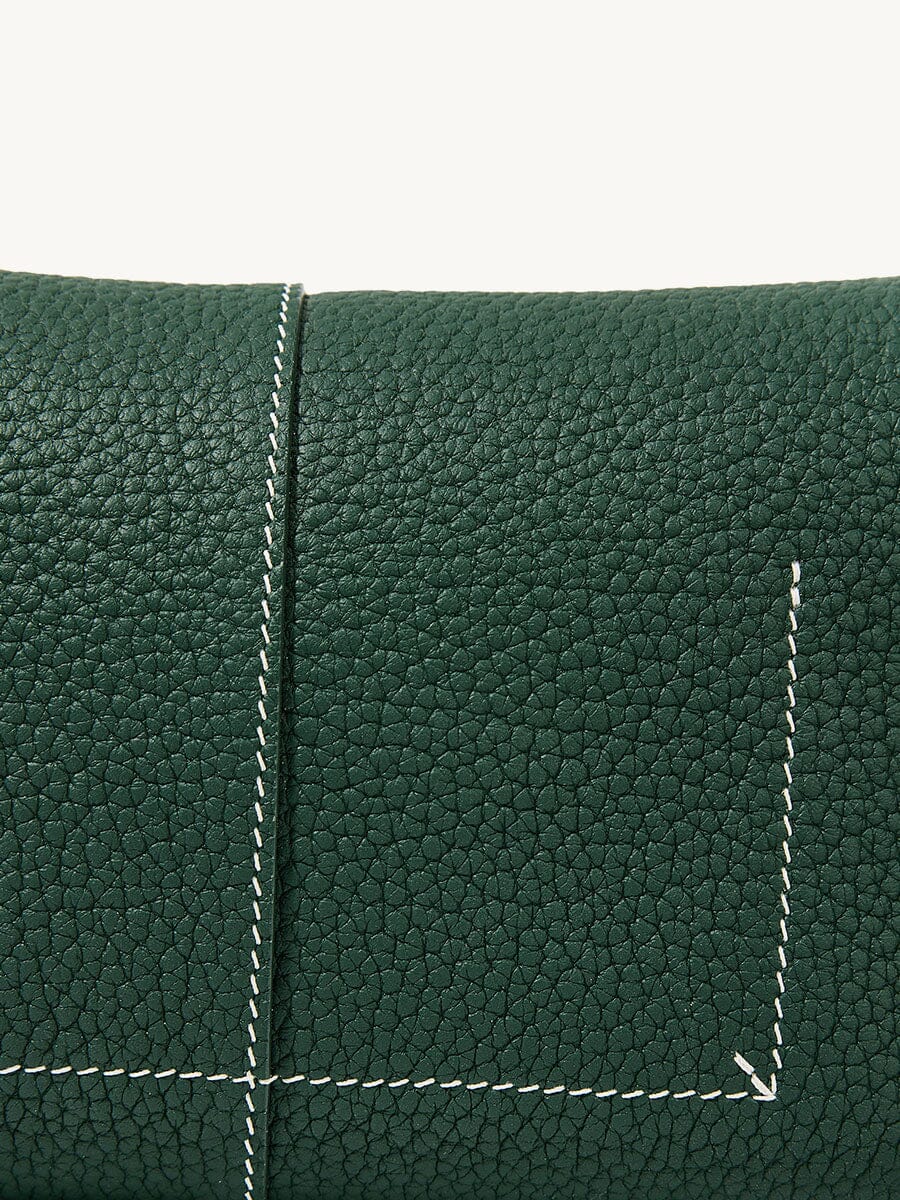 Songmont Small Drippy Roof Bag Emerald - close-up of pebbled leather and white stitching