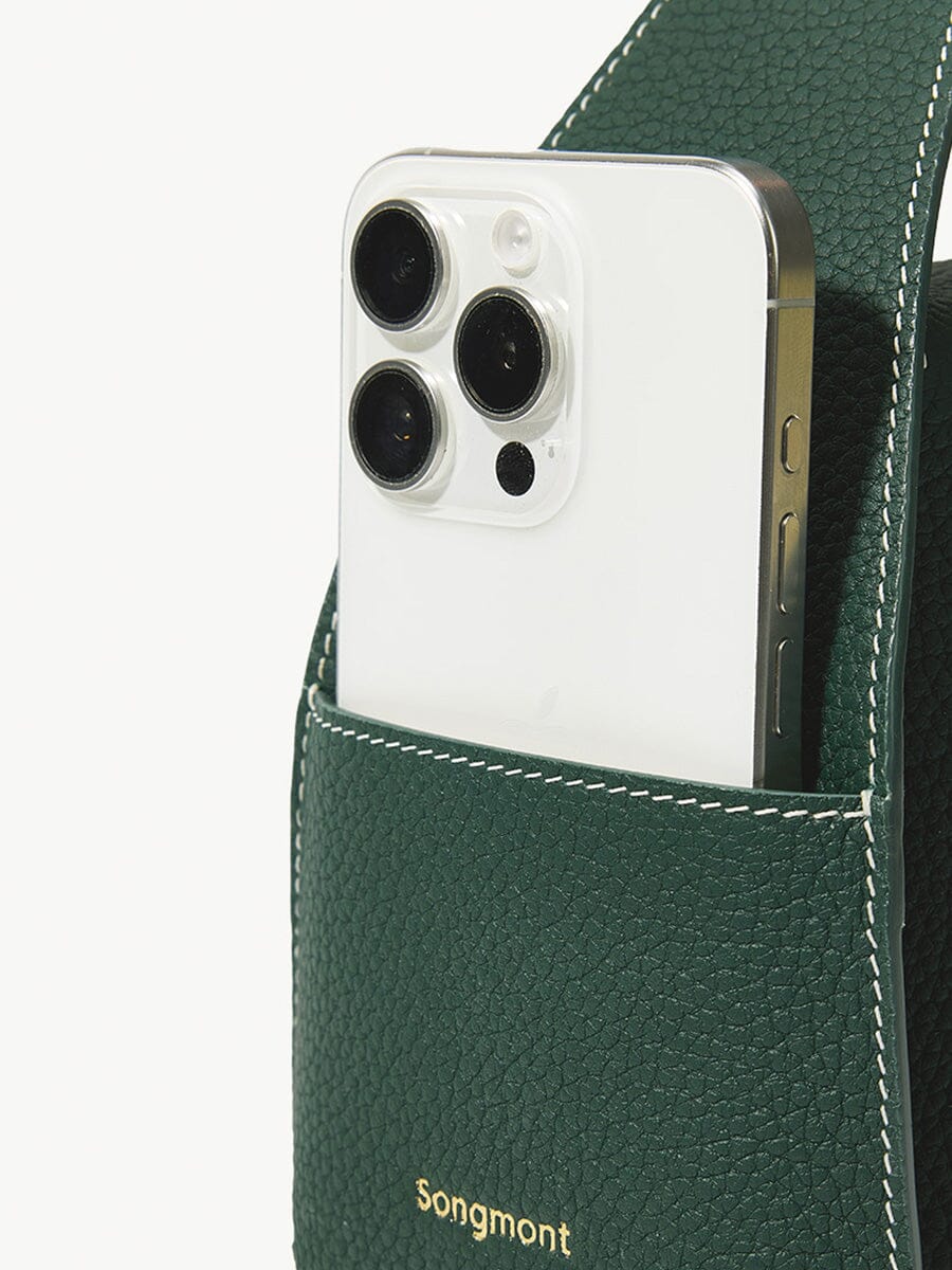 Songmont Small Drippy Roof Bag Emerald - phone tucked into the side pocket
