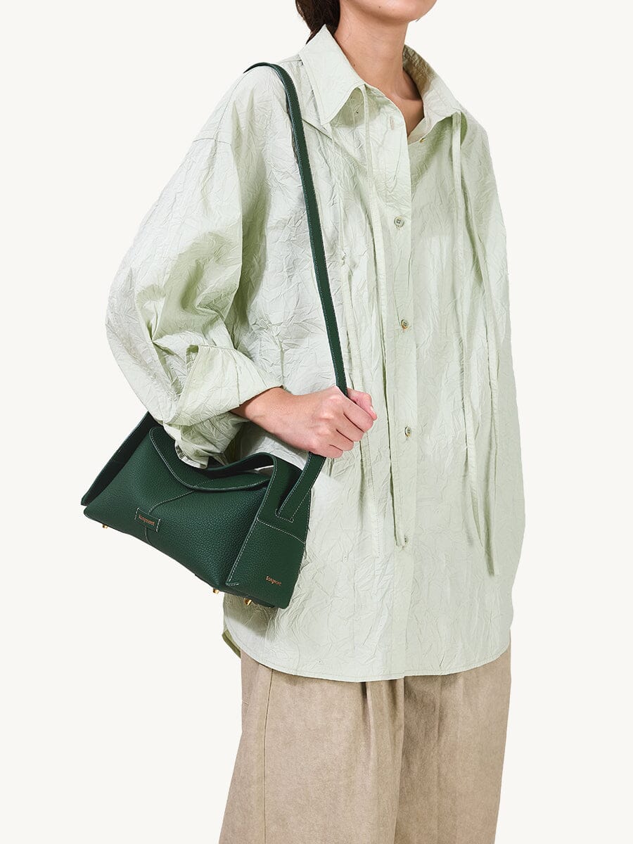 Songmont Small Drippy Roof Bag Emerald - worn on the shoulder with the strap